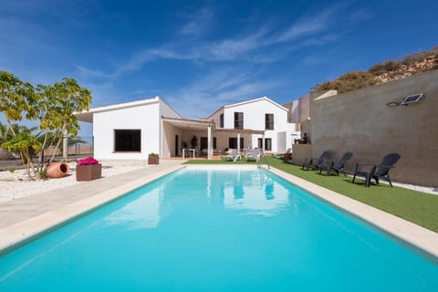 Property building, Living room, Swimming pool
