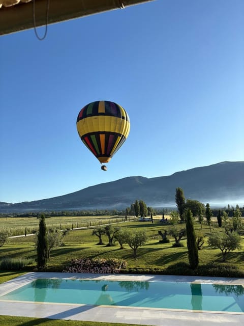 Property building, Day, Natural landscape, Activities, Bird's eye view, Mountain view, Pool view, Swimming pool