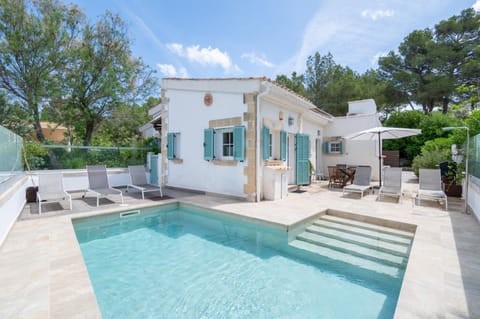 Property building, Living room, Swimming pool
