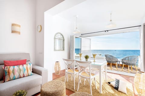 View (from property/room), Balcony/Terrace, Living room, Seating area, Dining area, Beach, Sea view