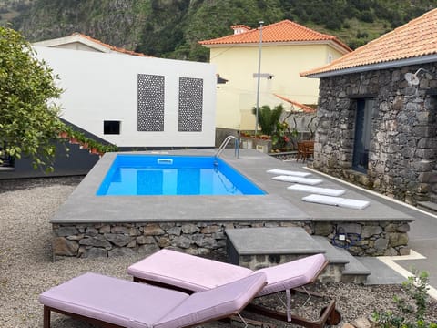 Property building, Pool view, Swimming pool, sunbed