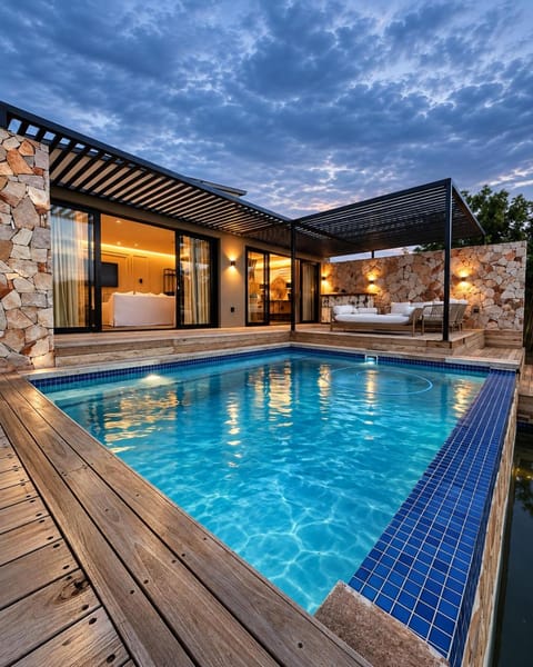 Property building, Patio, Living room, Seating area, Pool view, Swimming pool, Swimming pool