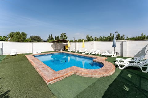 Property building, Living room, Swimming pool