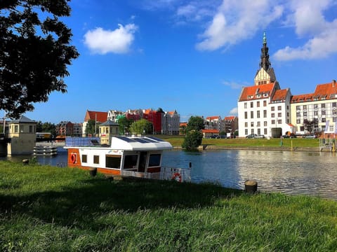 HOUSEBOAT Mazury Frajda Docked boat in Lithuania