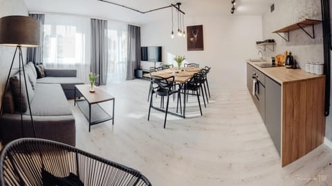 Kitchen or kitchenette, Living room, Seating area, Dining area
