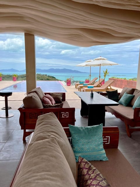 View (from property/room), Living room, Seating area, Sea view