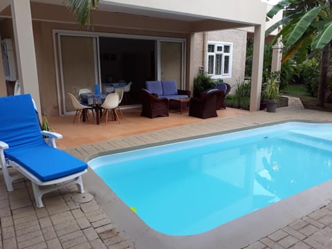 Swimming pool, sunbed