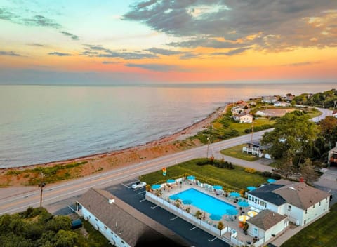 Property building, Nearby landmark, Property logo or sign, Neighbourhood, Natural landscape, Bird's eye view, View (from property/room), Balcony/Terrace, Beach, Beach, Hiking, Garden view, Landmark view, Landmark view, Pool view, Sea view, Street view, Swimming pool, Sunrise, Sunset, sunbed