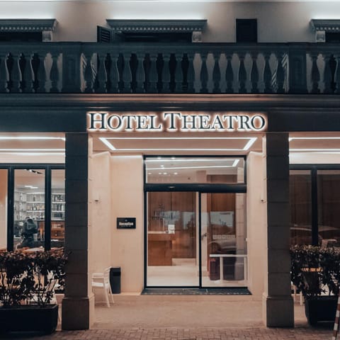 Property building, Facade/entrance, Night, Property logo or sign, View (from property/room), Balcony/Terrace, Lobby or reception, Decorative detail, Seating area, Text overlay