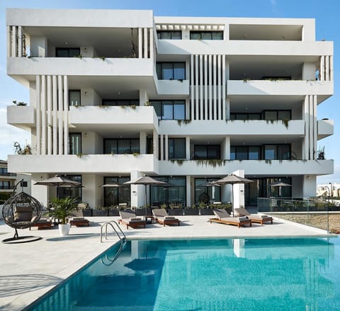 Property building, Day, View (from property/room), Pool view, Swimming pool, sunbed