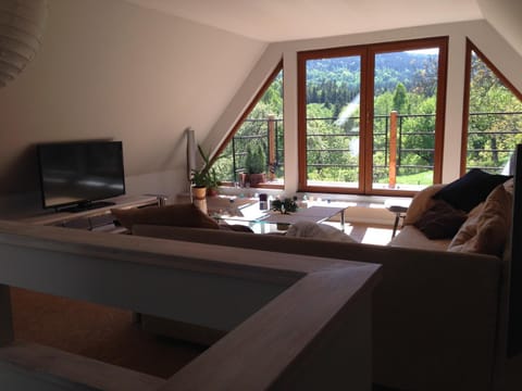 Communal lounge/ TV room, Natural landscape, Living room, Seating area
