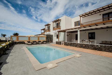Property building, Facade/entrance, Day, Balcony/Terrace, Pool view, Swimming pool, sunbed