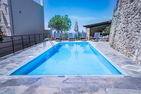 Patio, Day, Pool view, Swimming pool, sunbed