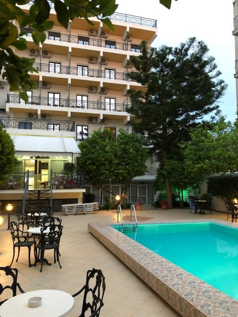 Property building, Patio, Pool view, Swimming pool, Swimming pool