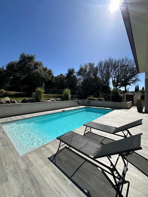 Swimming pool, sunbed