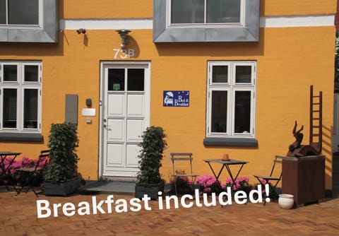 Property building, Day, Text overlay