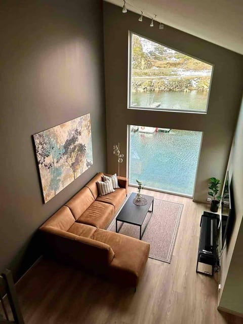 TV and multimedia, View (from property/room), Living room, Seating area, Sea view