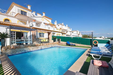 Property building, Living room, Swimming pool