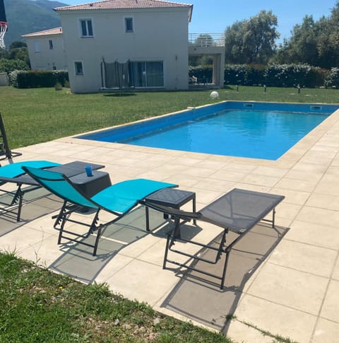Property building, Swimming pool, sunbed