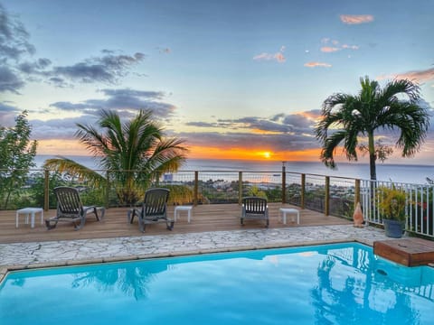 Patio, Natural landscape, Pool view, Sea view, Swimming pool, Swimming pool, Sunset, sunbed