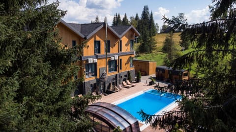 Property building, Natural landscape, Pool view, Swimming pool, sunbed