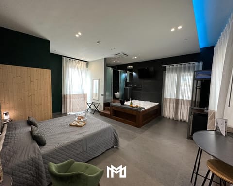 Bed, Seating area, Bedroom