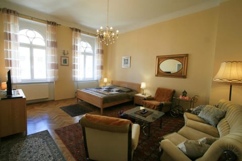 Bed, Living room, Seating area, Bedroom