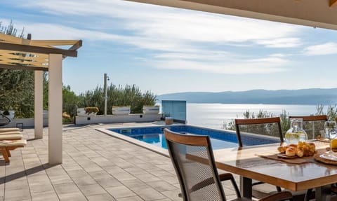 Property building, Balcony/Terrace, Seating area, Sea view, Swimming pool
