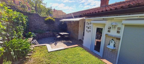 Property building, Patio, Garden, Garden view, sunbed