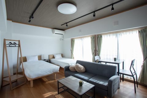 Bed, Seating area, Dining area, Bedroom, wardrobe, air conditioner