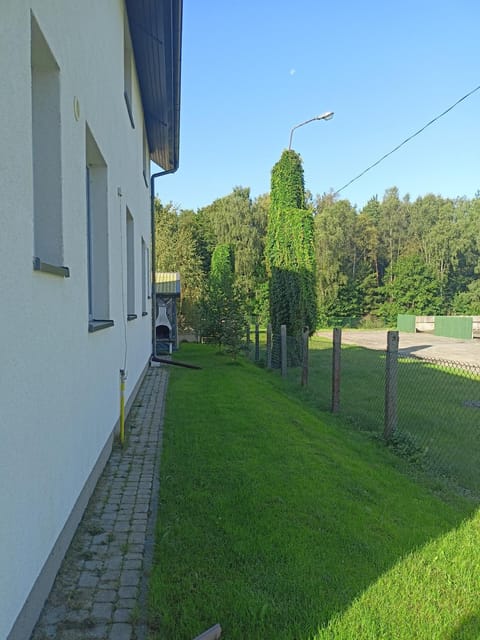 Domki Leśne Bliźniaki House in Pomeranian Voivodeship