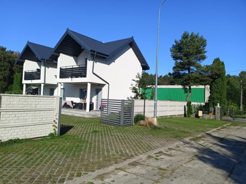 Domki Leśne Bliźniaki House in Pomeranian Voivodeship