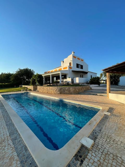 Property building, Swimming pool, sunbed