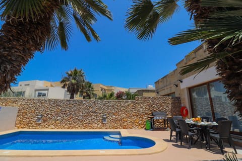 Property building, BBQ facilities, Swimming pool, Sunset