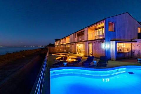 Property building, Patio, Night, Natural landscape, Pool view, Sea view