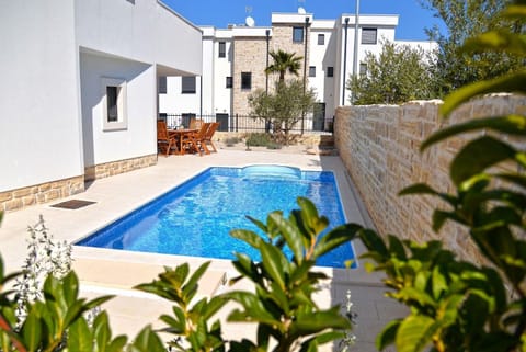 Facade/entrance, Swimming pool