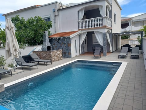 Patio, BBQ facilities, Swimming pool, Inner courtyard view