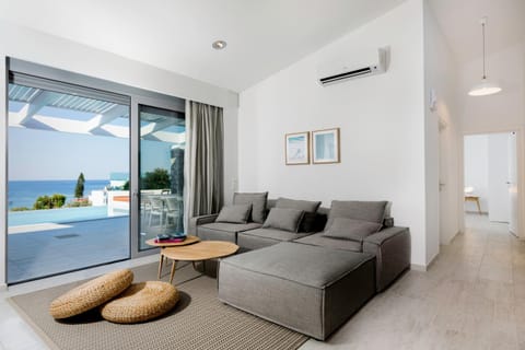 Living room, Seating area, Pool view, Sea view
