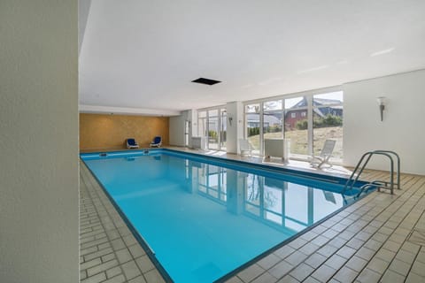 Property building, Living room, Swimming pool