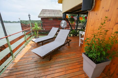 Sagando - Floating house on Sava river Docked boat in Belgrade