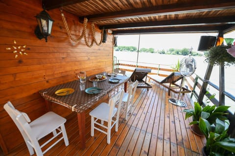Sagando - Floating house on Sava river Docked boat in Belgrade