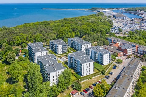 Property building, Nearby landmark, Neighbourhood, Natural landscape, Bird's eye view, Beach, Beach, Location