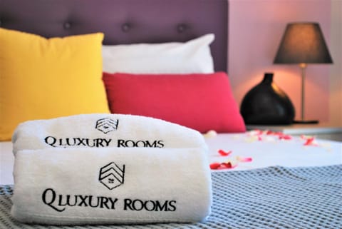 Bed, Property logo or sign, Bedroom