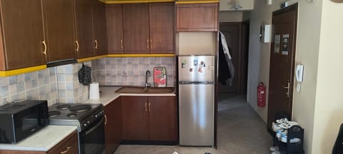 Kitchen or kitchenette, oven, stove