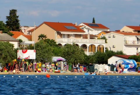 Property building, Nearby landmark, Neighbourhood, Beach, Location
