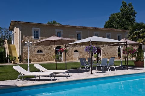 Property building, Patio, Garden, Swimming pool