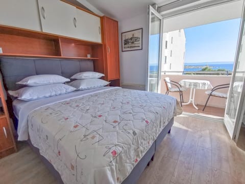 Bed, View (from property/room), Balcony/Terrace, Seating area, Bedroom, Sea view