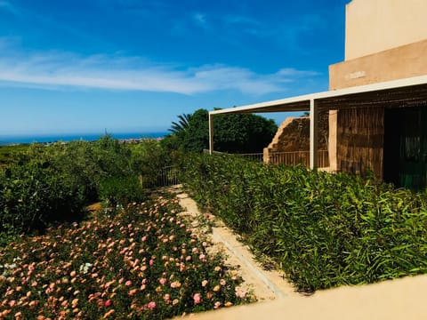 Property building, Spring, Natural landscape, Garden, Garden view, Sea view