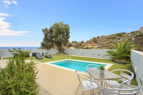 Property building, Living room, Swimming pool