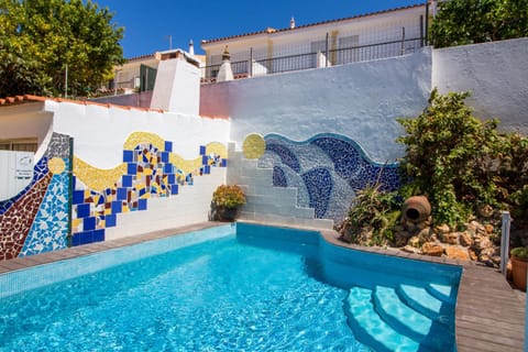 Swimming pool, sunbed
